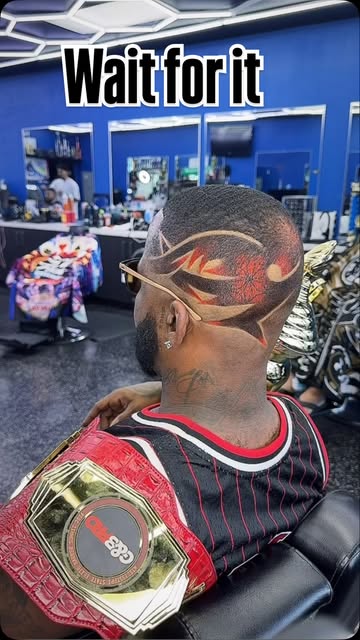 Detailed flame-inspired hair design by Bo, photographed from behind