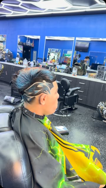 Finished graphic haircut by Bo, photographed inside Wrist Flickers Barbershop